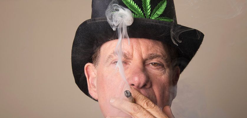Ed Rosenthal, man smoking joint in top hat with weed leaf